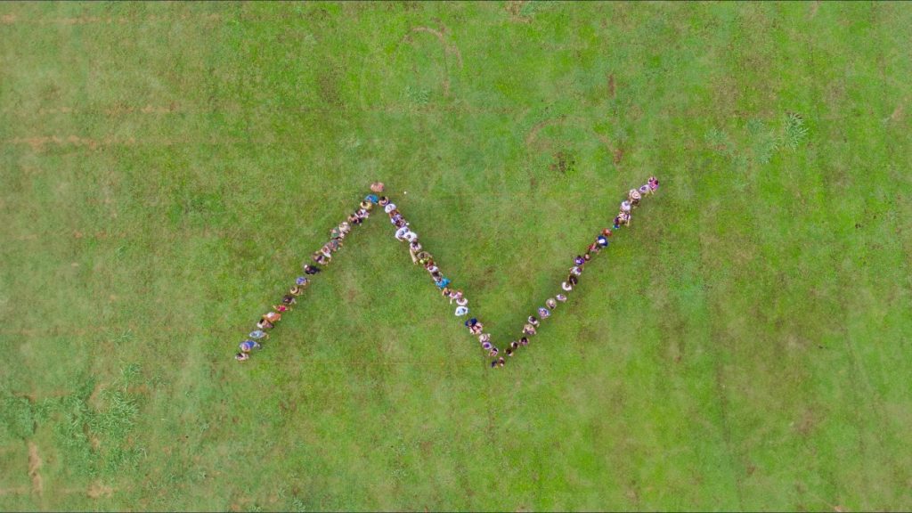 Family and community members gathered at Namahana’s permanent campus site for a historic drone photo where they all gathered in the shape of an N on Aug. 4, 2025. (Picture Courtesy: Namahana School)