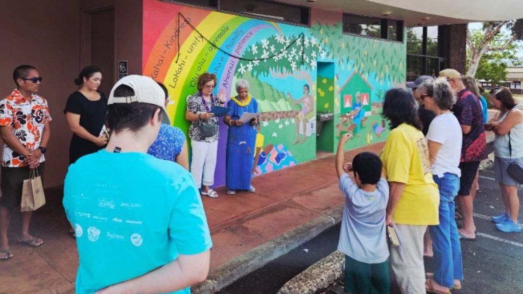The community gathered on Sept. 12 for a public dedication ceremony and blessing of the completed mural at the Līhu'e Public Library. (Photo Credit: The Hawai’i State Public Library System)