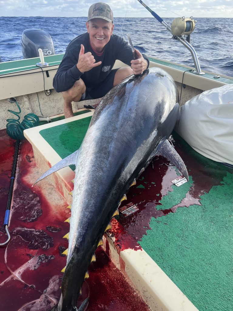 Billy Fine and the giant bluefin tuna he reeled in with the help of his longtime friend Ryan McKnight on Jan. 23, 2026. (Photo Credit: Ryan McKnight)