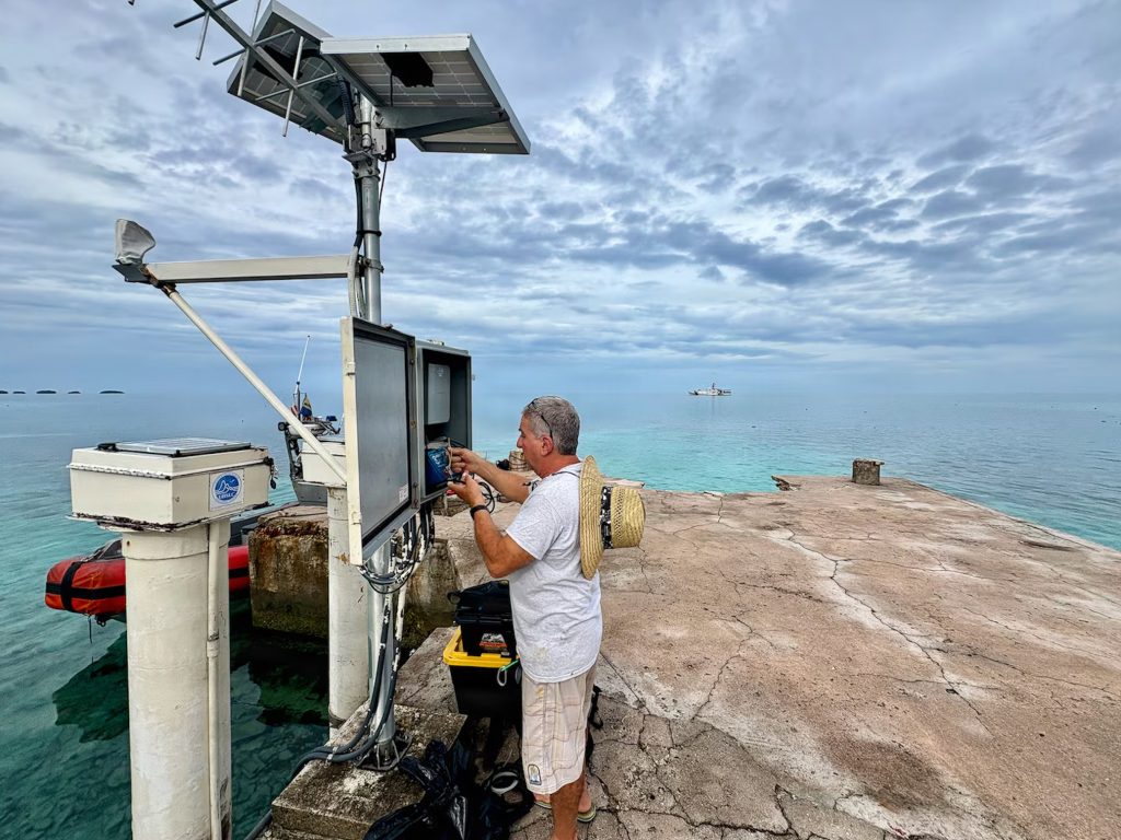 The crew of the U.S. Coast Guard Cutter Oliver Henry restored a critical tsunami early warning station on a remote Pacific atoll. (Photo Credit: U.S. Coast Guard)