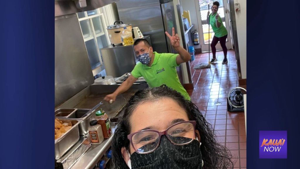 Frederico Mexican Restaurant owner Maria Fernandez (front) and Tito Reyes have fun during a shift. (Photo Courtesy: Maria Hernandez)