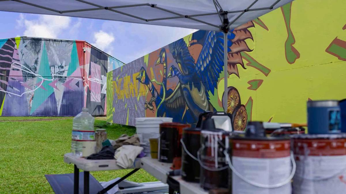 A 500-foot mural by 11 artists was painted on a construction wall at Common Ground Kauaʻi in Kīlauea. (Photo Courtesy: Common Ground Kauaʻi)