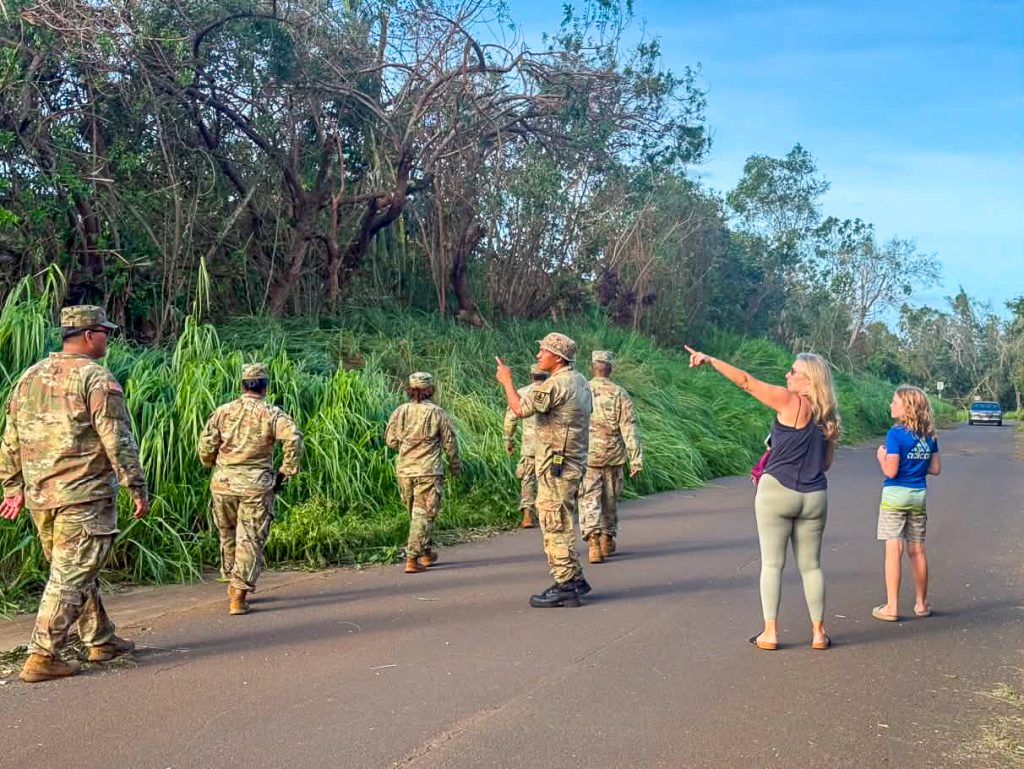 Residents and a Hawaiʻi National Guard team walked and assessed the damaged caused by Hurricane Lowell late Labor Day. Sept. 8, 2026. (Xiomara Yamileth/Kauaʻi Now)
