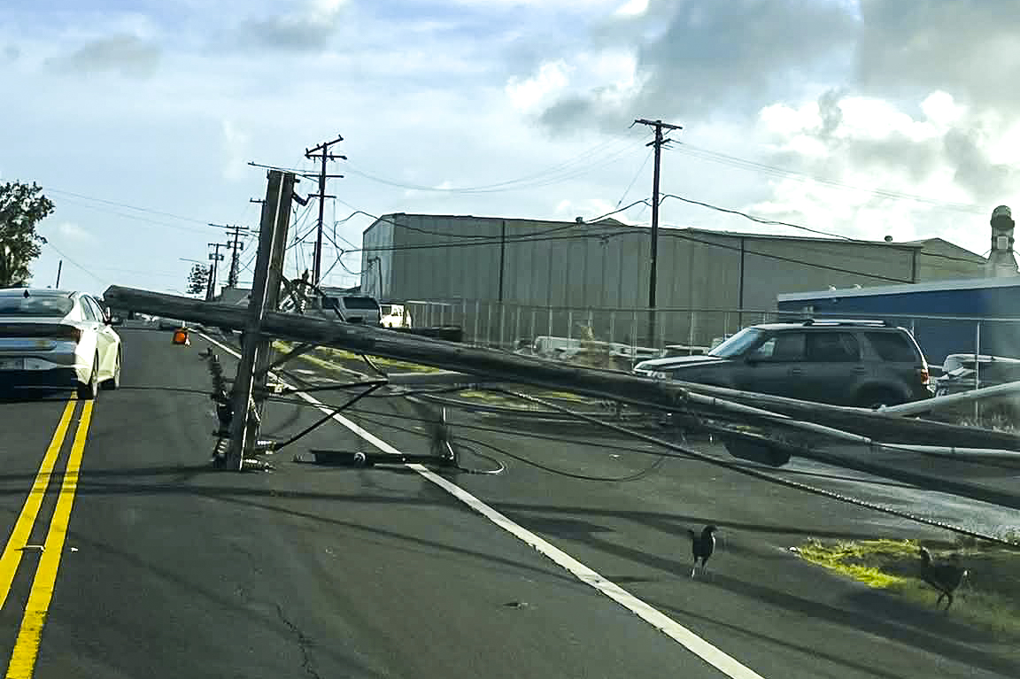 Several power poles were seen on the ground in Kapaʻa after Hurricane Lowell battered Kauaʻi. Sept. 8, 2026. (Photo Credit : Jonah Stein)